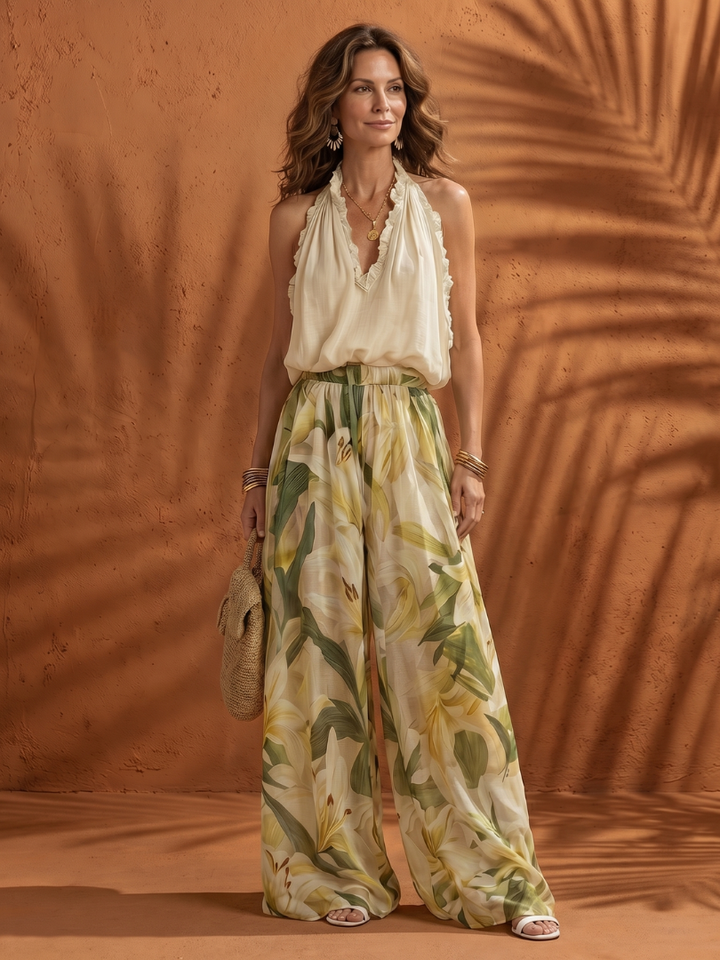 Solange | Blusa con Collo Halter e Pantaloni a Gamba Larga Floreali