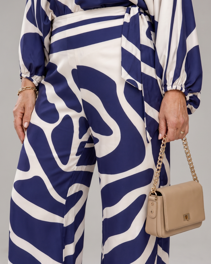 Sulaya | Top Off Shoulder con Stampa Astratta e Pantaloni a Gamba Larga