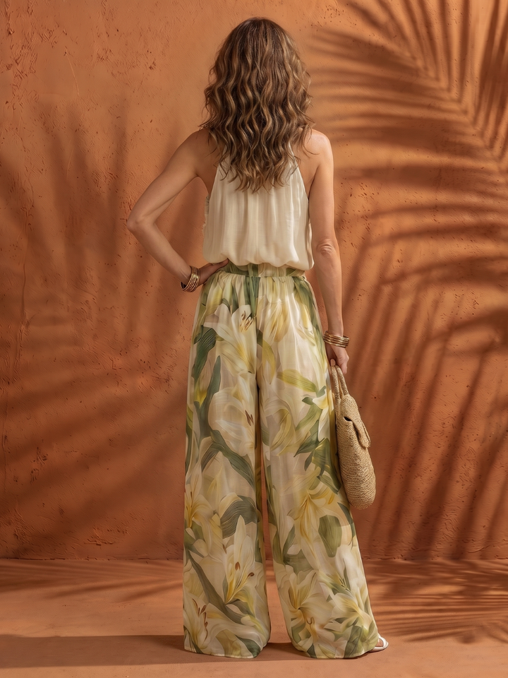 Solange | Blusa con Collo Halter e Pantaloni a Gamba Larga Floreali