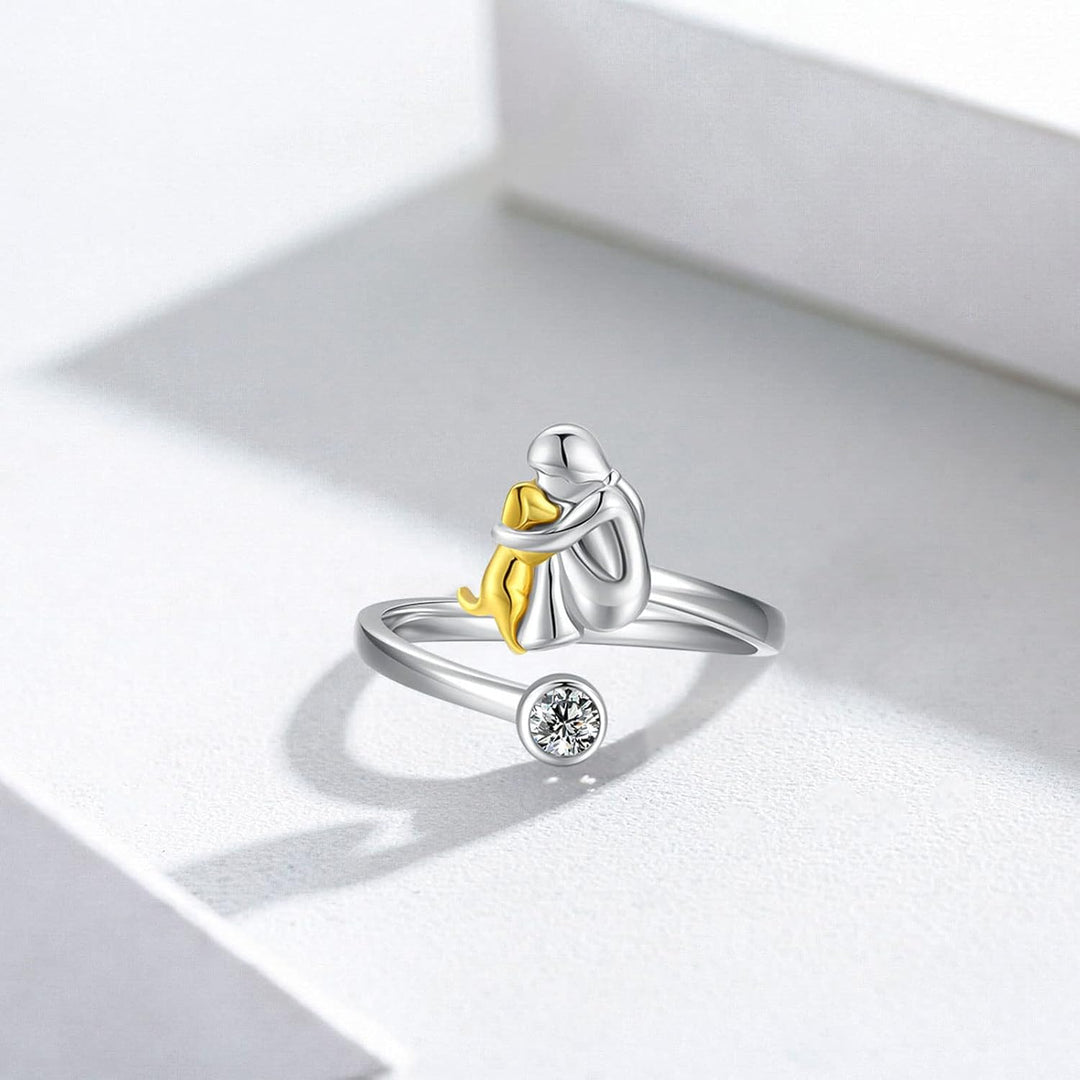 Silver ring with a dog and zirconia stones.