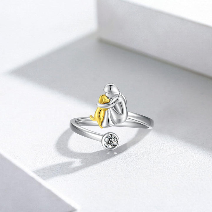 Silver ring with a dog and zirconia stones.