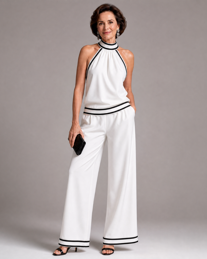 Zephyrine | Jumpsuit a gamba larga con scollatura a halter e dettagli a contrasto