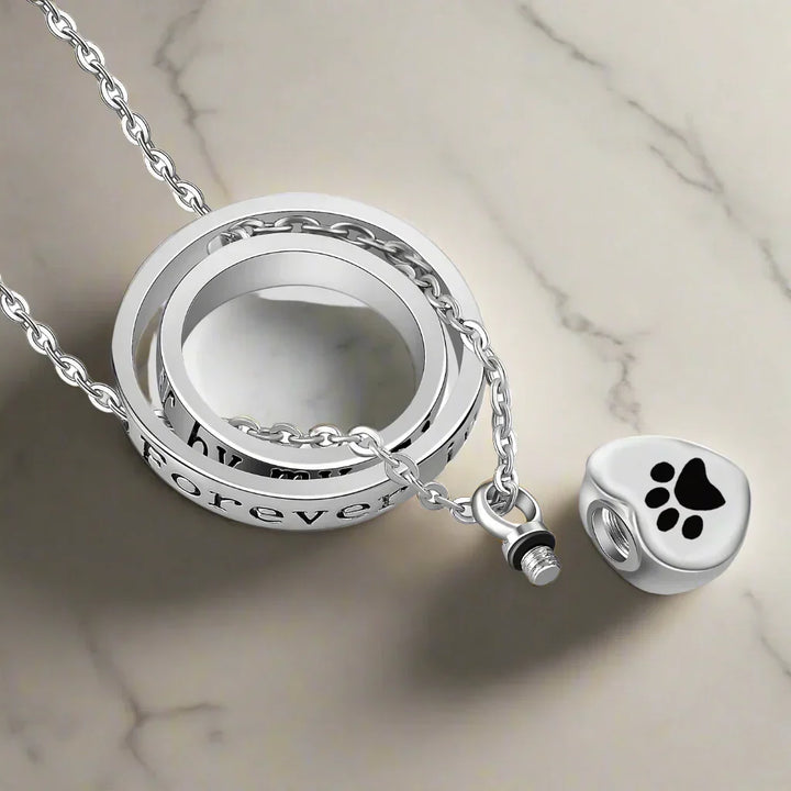 Necklace with urn in the shape of a paw print made of stainless steel