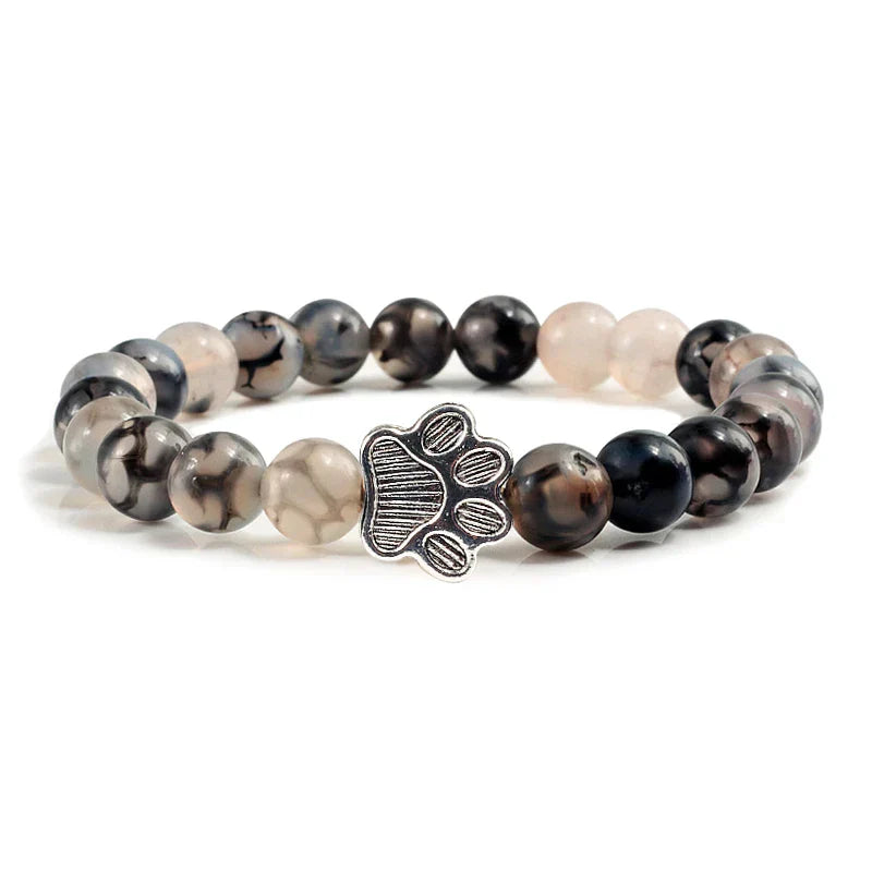 Bracelet with paw prints decorated with beads