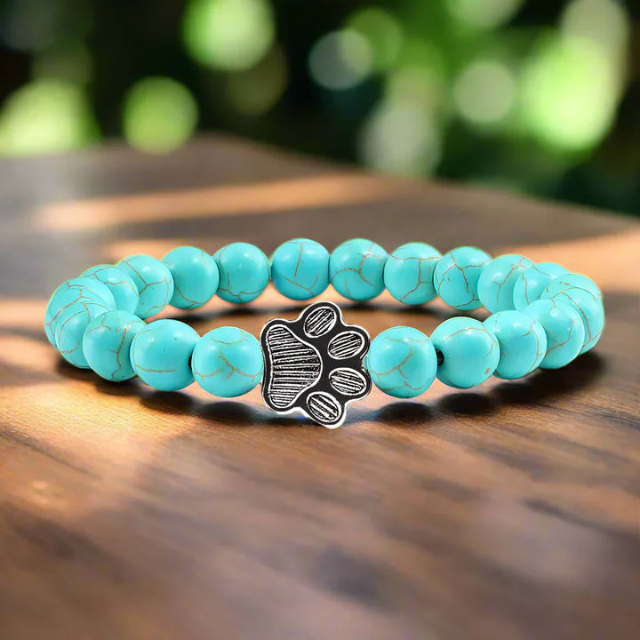 Bracelet with paw prints decorated with beads