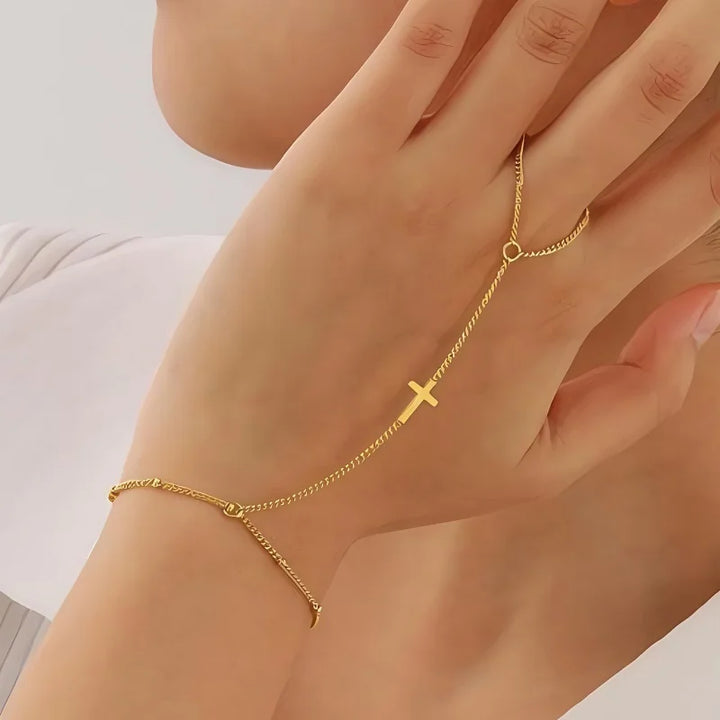 Bracelet à main en croix dorée