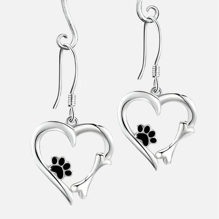 Silver dangling earrings with heart and paw print motif
