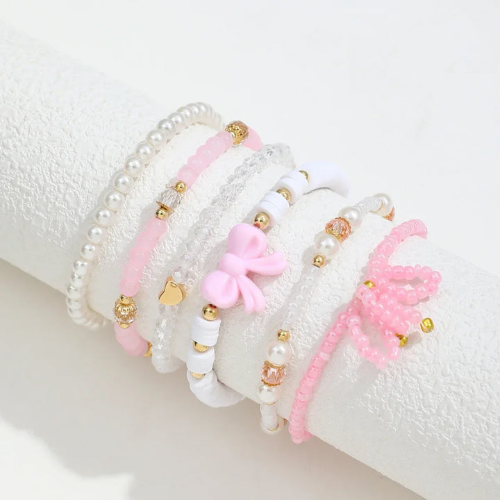 Ensemble de bracelets en perles et nœud d'amour