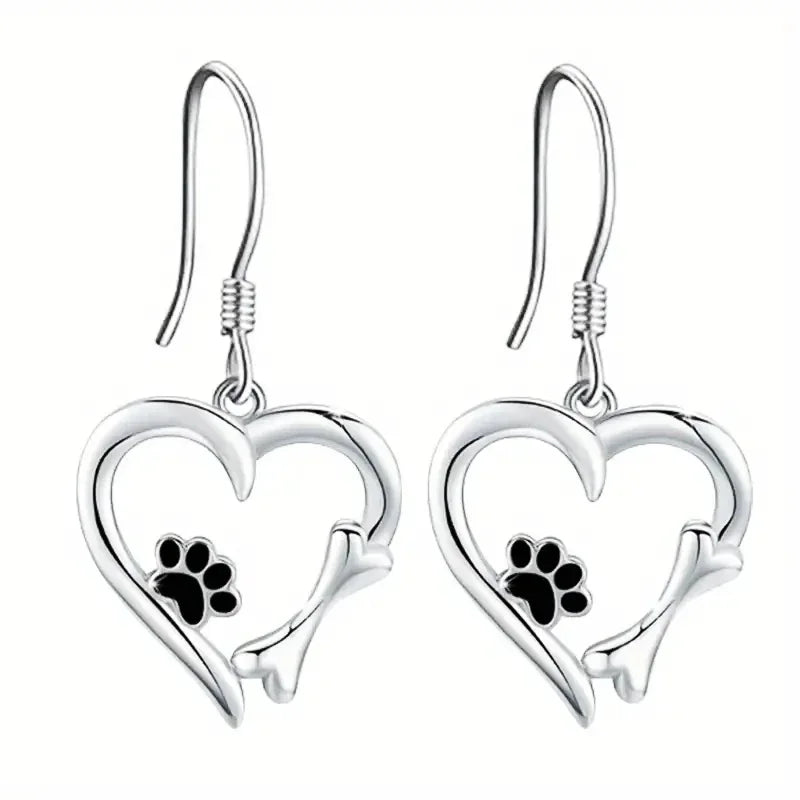 Silver dangling earrings with heart and paw print motif