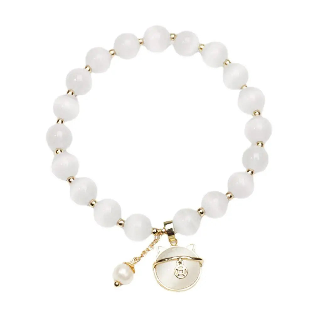 Bracelet en perles avec pendentif chat porte-bonheur