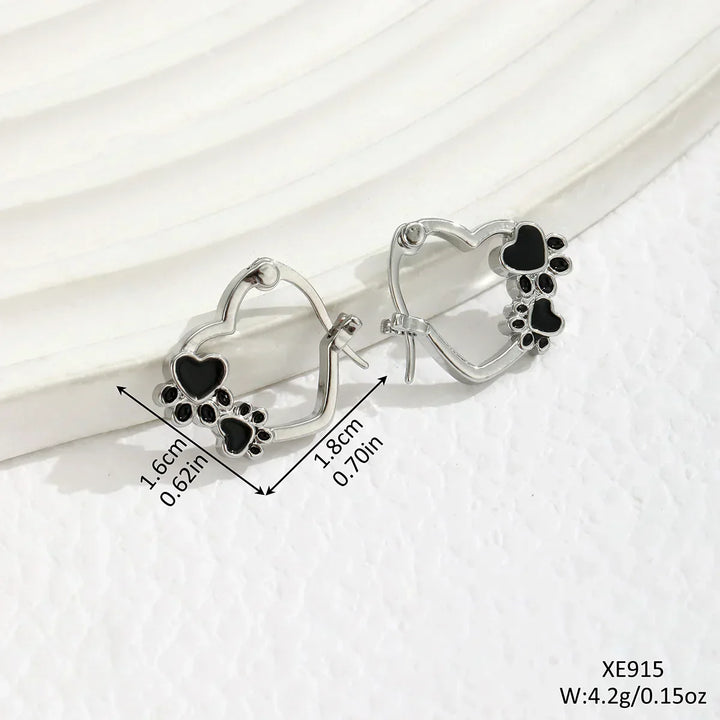 Huggie earrings with heart and black enamel.