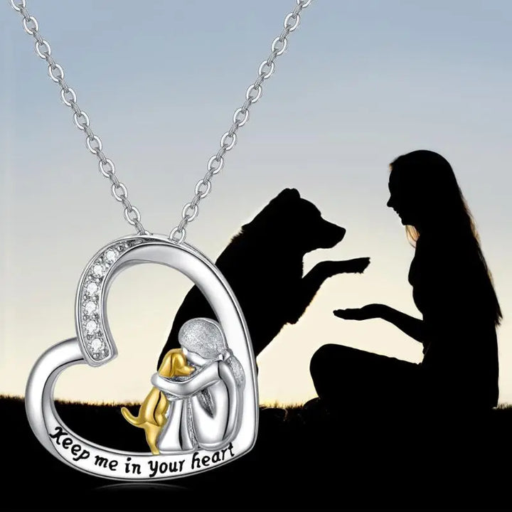 Silver necklace with heart, dog, and zirconia stones