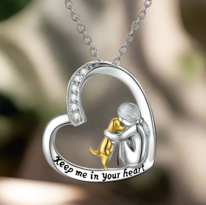 Silver necklace with heart, dog, and zirconia stones