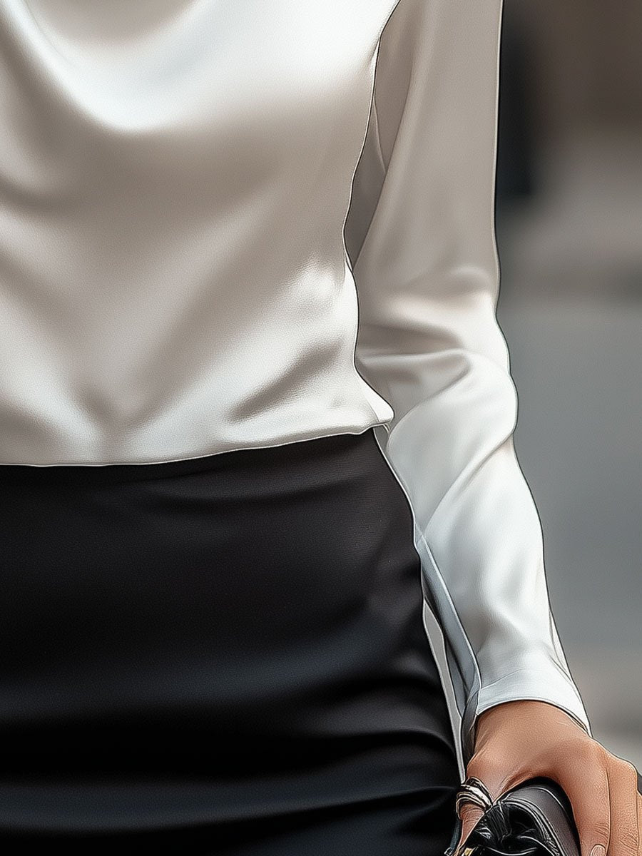 Blouse en satin élégante avec décolleté drapé
