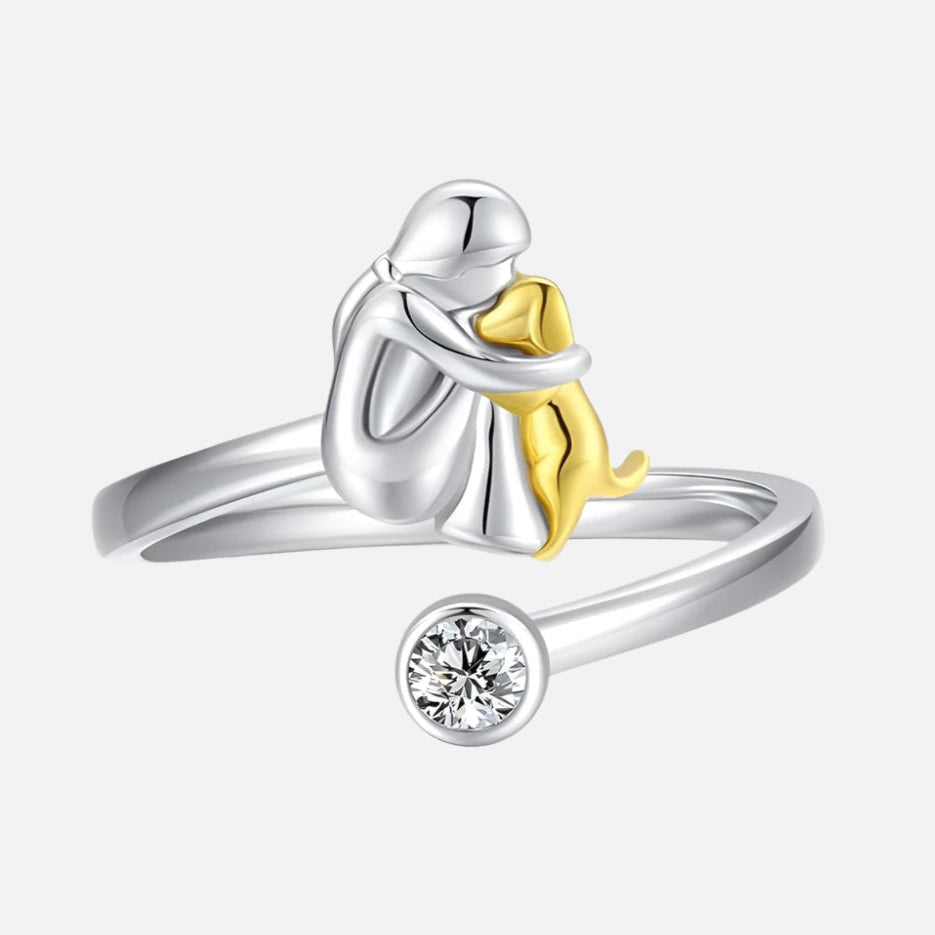 Silver ring with a dog and zirconia stones.